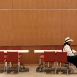 An attendee waits for a job interview during a job fair on June 29, 2024, in New York City, N.Y. In a survey of 1,000 U.S. job seekers, 84% said they prefer to have a person conduct an initial interview to answer simple questions, rather than AI.