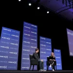 Adam Evans, CEO, Salesforce AI, and Cristina Criddle, technology reporter for the Financial Times, speak onstage during HumanX AI Conference 2025 on March 11, 2025, in Las Vegas, Nev. Salesforce made headlines in February 2025 when it cut 1,000 jobs to make room for hiring around its AI product, Agentforce.