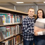 PARMA HEIGHTS, OH — JANUARY 26: Ukrainians Marta and Taras Chaban who fled the violence of the war pose for a portrait at the library where they take English classes twice a week, January 26, 2023, at the Cuyahoga County Public Library – Parma Heights Branch, in Parma Heights, Ohio. (Photo by Graham Stokes for Ohio Capital Journal)
